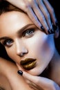 Beautyful girl with gold glitter on her face Royalty Free Stock Photo