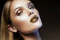 Beautyful girl with gold glitter on her face Royalty Free Stock Photo