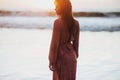 Woman feeling free meeting sun near the sea Royalty Free Stock Photo