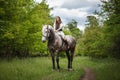 Beautyful woman with horse in Ukrainian national dress.