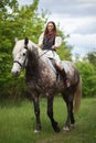 Beautyful woman with horse in Ukrainian national dress.