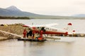 A beaver being used to transport firemen to the wilderness Royalty Free Stock Photo