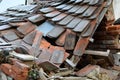 Beaver tail roof tiles. sunken inside as the beams were destroyed by a wood-destroying fungus. It is necessary to reconstruct the Royalty Free Stock Photo