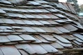 Beaver tail roof tiles. sunken inside as the beams were destroyed by a wood-destroying fungus. It is necessary to reconstruct the Royalty Free Stock Photo