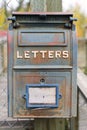 Beaver, Yukon Territory, Alaska, USA. Front view of vintage Post Office letter box. Royalty Free Stock Photo