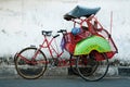 Becak cyclo rider resting yogyakarta java indonesia