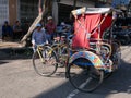 Becak or Pedicabs in Indonesia parked on the roadside