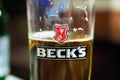 Beck`s cold fresh beer in transparent glass Royalty Free Stock Photo