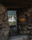 Beckov village view from a small stone window trees and buildings around Royalty Free Stock Photo