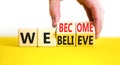 We become or believe symbol. Concept word We believe We become on wooden cubes. Beautiful yellow table white background. Royalty Free Stock Photo