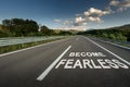 Become Fearless message on Asphalt highway road through the countryside