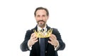 Become king ceremony. King attribute. Become next king. Monarchy family traditions. Man nature bearded guy in suit hold Royalty Free Stock Photo