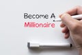 Become a millionaire written on whiteboard Royalty Free Stock Photo