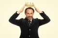 Become next king. Monarchy family traditions. Man nature bearded guy in suit hold golden crown symbol of monarchy Royalty Free Stock Photo