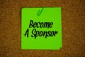 Become a Sponsor text message on stick note on cork paper background Royalty Free Stock Photo