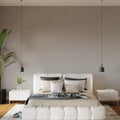 Bed in the bedroom with lamps pillows and bedspread in front of the grey wall interior wall mockup