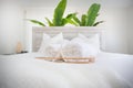 bed decor, basket, rolled white bath towel, hotel, resort