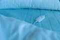 Bed with electric heating pad, closeup view Royalty Free Stock Photo