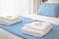 Bed with fresh towels Royalty Free Stock Photo