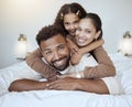 Bed, happy family and girl in bedroom, happy and smile while bond, hug and having fun together. Love, portrait and black Royalty Free Stock Photo