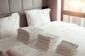 Bed with headboard with clean white pillows and sheets in apartment. cleaned hotel room Royalty Free Stock Photo