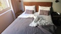 Bed at home bedroom which rest,interior and comfort unmade bed Royalty Free Stock Photo
