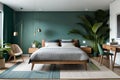 Bed between ladder and plant in green boho bedroom interior with grey carpet under lamps Royalty Free Stock Photo