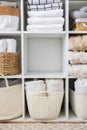 Bed linens closet neatly arrangement on shelves with copy space domestic textile Nordic minimalism