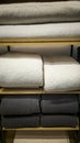 Bed linens, pillows, textiles and towels on a shelf Royalty Free Stock Photo