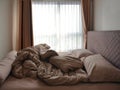 Bed Mattress Pillows and Blanket messed up in bedroom Royalty Free Stock Photo