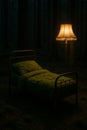 Bed with moss bedding and lamp in dark forest Royalty Free Stock Photo