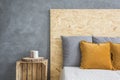 Bed with OSB haeadboard Royalty Free Stock Photo