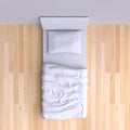 Bed with pillow and blanket in the corner room Royalty Free Stock Photo