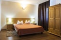 Bed and room, interior view of house Royalty Free Stock Photo