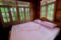 Bed room in luxury honeymoon sweet suits. Honey moon bed.Honeymoon, Wedding bed topped with rose and marigold petals.