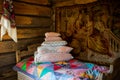 Made bed. bedroom. Interior of an old Russian hut Bed in a Russian hut. Interior items with ancient utensils Old Russian life Royalty Free Stock Photo