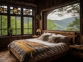 A bed with a view of mountains. Mountain guesthouse in the Romanian countryside. Authentic interior of a wooden house