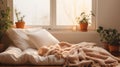 Bed with white blanket and pillows in front of window, World Sleep Day concept, boho style apartment design Royalty Free Stock Photo