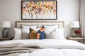 bed with white linens and colorful throw pillows