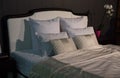 Bed with white pillows
