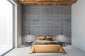 Bed in wooden grey brick living room