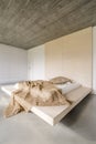 Bed on wooden platform