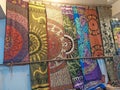 Textile bedcovers with Indian ornaments for sale.