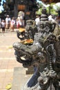 Bedogol guardian statue at a temple Ceremony in Bali.