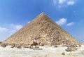 Bedouin on camel near pyramid of Khafre or of Chephren, is the second-tallest and second-largest of the Ancient Egyptian Pyramids Royalty Free Stock Photo