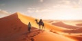 Bedouin with camel silhouette in the sand dunes of the Thar desert at sunset. caravan in rajasthan travel background safari