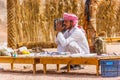 Bedouin in the desert and his souvenir shop.