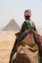 Bedouin facing a Pyramid