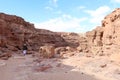 A Bedouin man walking alone in the middle of canyon Salama in Sinai