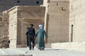 Bedouin and police man at the Philae Temple Royalty Free Stock Photo